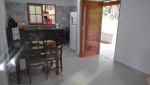 Casa em frente a Cachoeira do Tobogã