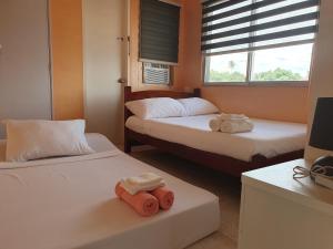 Simala Beach House Beachfront 4BR Retreat by the Sea