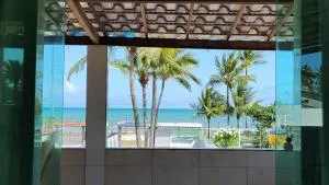 Quarto aconchegante e sossegado frente ao mar - Cacha Pregos