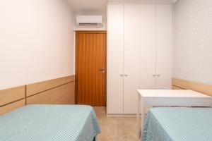 Apto a 350m Praia Cozinha completa Churrasqueira Ar Condicionado Wi-Fi e vaga privativa de garagem Reserve agora mesmo