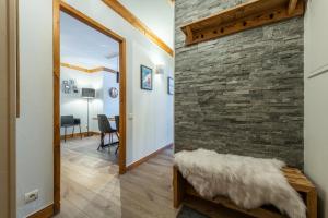 Appartement 4-5 personnes skis aux pieds piscine intérieure sauna hammam