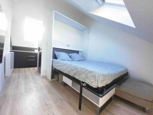 Appartements La Suite 5 etoiles 30G rue General Margueritte : photos des chambres