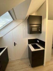 Appartements La Suite 5 etoiles 30G rue General Margueritte : photos des chambres