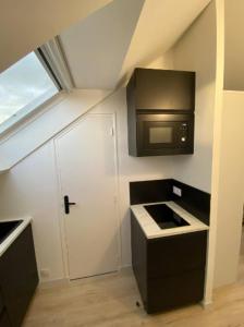 Appartements La Suite 5 etoiles 30G rue General Margueritte : photos des chambres