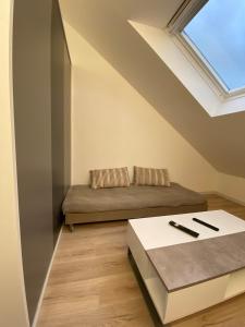 Appartements La Suite 5 etoiles 30G rue General Margueritte : photos des chambres