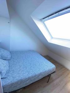 Appartements La Suite 5 etoiles 30G rue General Margueritte : photos des chambres