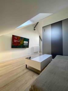 Appartements La Suite 5 etoiles 30G rue General Margueritte : photos des chambres