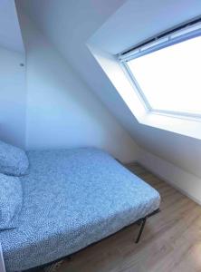 Appartements La Suite 5 etoiles 30G rue General Margueritte : photos des chambres