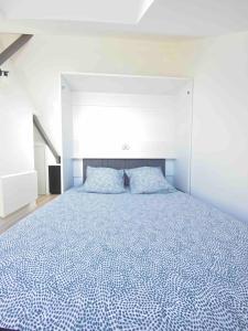 Appartements La Suite 5 etoiles 30G rue General Margueritte : photos des chambres