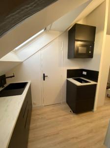 Appartements La Suite 5 etoiles 30G rue General Margueritte : photos des chambres
