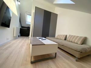 Appartements La Suite 5 etoiles 30G rue General Margueritte : photos des chambres