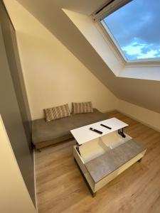 Appartements La Suite 5 etoiles 30G rue General Margueritte : photos des chambres