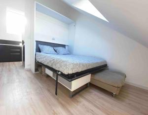 Appartements La Suite 5 etoiles 30G rue General Margueritte : photos des chambres