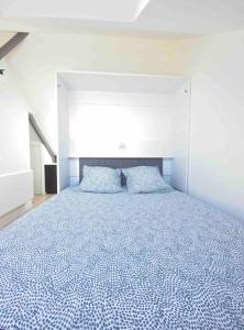 Appartements La Suite 5 etoiles 30G rue General Margueritte : photos des chambres