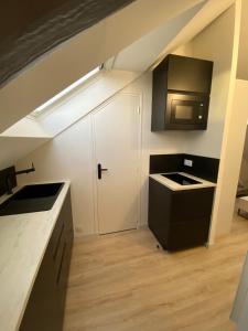 Appartements La Suite 5 etoiles 30G rue General Margueritte : photos des chambres