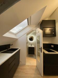 Appartements La Suite 5 etoiles 30G rue General Margueritte : photos des chambres