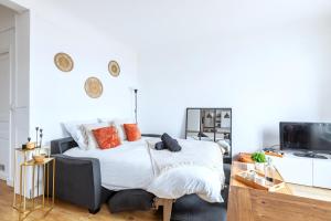 Appartements Le Clair & Spacieux - Parking - 15 min Paris : photos des chambres