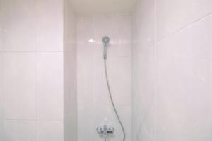 Nice Studio at Evenciio Margonda Apartment By Travelio