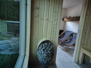 Domek Viking z prywatnym ogrzewanym basenem sauną oraz balią z jacuzzi