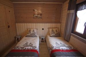 Maisons de vacances Chalet Les Volets Rouges : photos des chambres