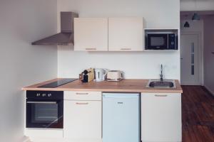 Large Studio lumineux et neuf, Parking Gratuit