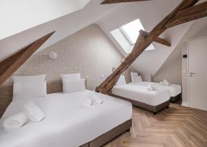 Appart'hotels L-Horloge - Appart-Hotel proche de Disneyland : photos des chambres