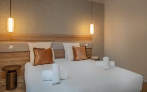 Appart'hotels L-Horloge - Appart-Hotel proche de Disneyland : photos des chambres