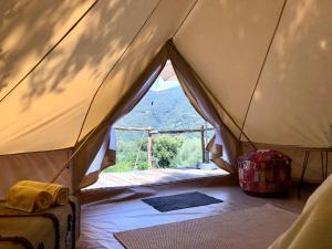 Tentes de luxe glamping Bonheur : photos des chambres