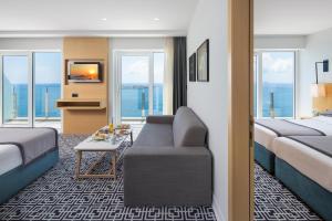Premium Family Suite with Balcony and Sea View room in Royal Neptun Hotel