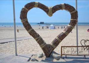 Appartements Caprices des vagues - A 300 m de la plage et a 4 kilometres de Nausicaa, Place de parking privee, Eau douce, Netflix, Primes Video, Wifi haut debit : photos des chambres