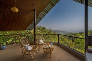 SaffronStays Raanwaara Luxe - 2BR villa with dual balcony jacuzzis, infinity swing & private waterfall, luxurious escape