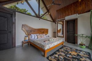 SaffronStays Raanwaara Luxe - 2BR villa with dual balcony jacuzzis, infinity swing & private waterfall, luxurious escape