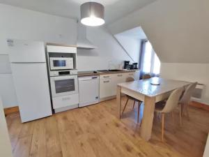 Appartements L'Alexiane, Centre Luchon, parking gratuit, wifi : photos des chambres