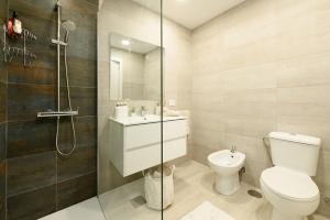 Home2Rest at Los Gigantes - 1 min to beach, restaurants, city center - 1bdr