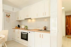 Home2Rest at Los Gigantes - 1 min to beach, restaurants, city center - 1bdr