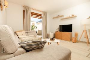 Home2Rest at Los Gigantes - 1 min to beach, restaurants, city center - 1bdr