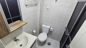 Apto aconchegante perto da praia