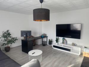 Schöne Wohnung in grüner Lage mit Fitnessgerät