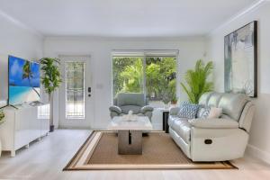 Tropical 3BR Escape with Pool, 7 Min Drive to Beach