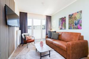 Das Solaris 4 Beach Apartment mit Balkon, Gemeinschaftssauna und Grillplatz