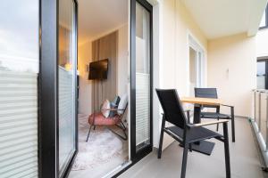 Das Solaris 4 Beach Apartment mit Balkon, Gemeinschaftssauna und Grillplatz