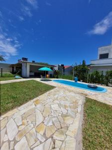 Casa com piscina em Arroio do Sal