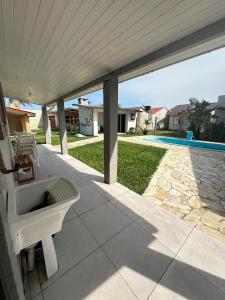 Casa com piscina em Arroio do Sal