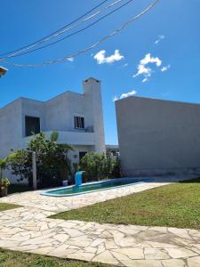 Casa com piscina em Arroio do Sal