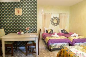 B&B / Chambres d'hotes lO GORISSADO - La ferme du glandier : photos des chambres