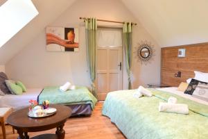 B&B / Chambres d'hotes lO GORISSADO - La ferme du glandier : photos des chambres