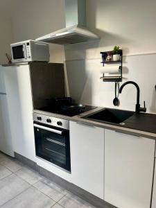 Appartements Appartement en centre ville : photos des chambres