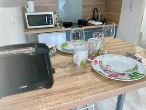Appartements Studio en centre ville : photos des chambres