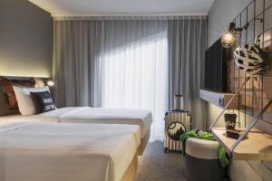 Twin Room room in Moxy Lausanne City