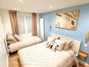 Appartements DisneyLand et Paris - Appartement Cosy : photos des chambres